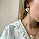 Boucles d’oreilles perles en céramique coeur blanc interchangeables