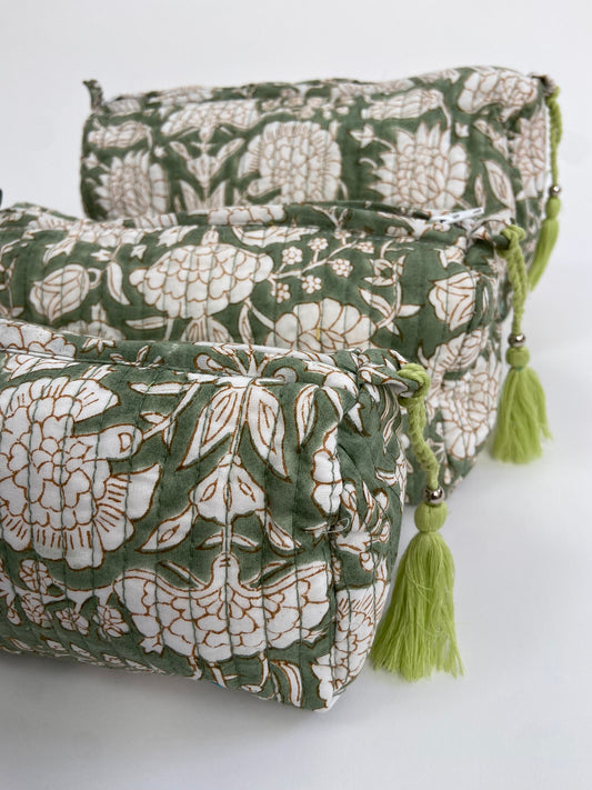 Quilted toiletry bag with sage floral pattern